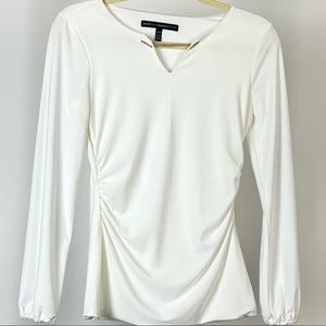White House Black Market Long sleeve blouse w/gold chain attachment (NWOT).
